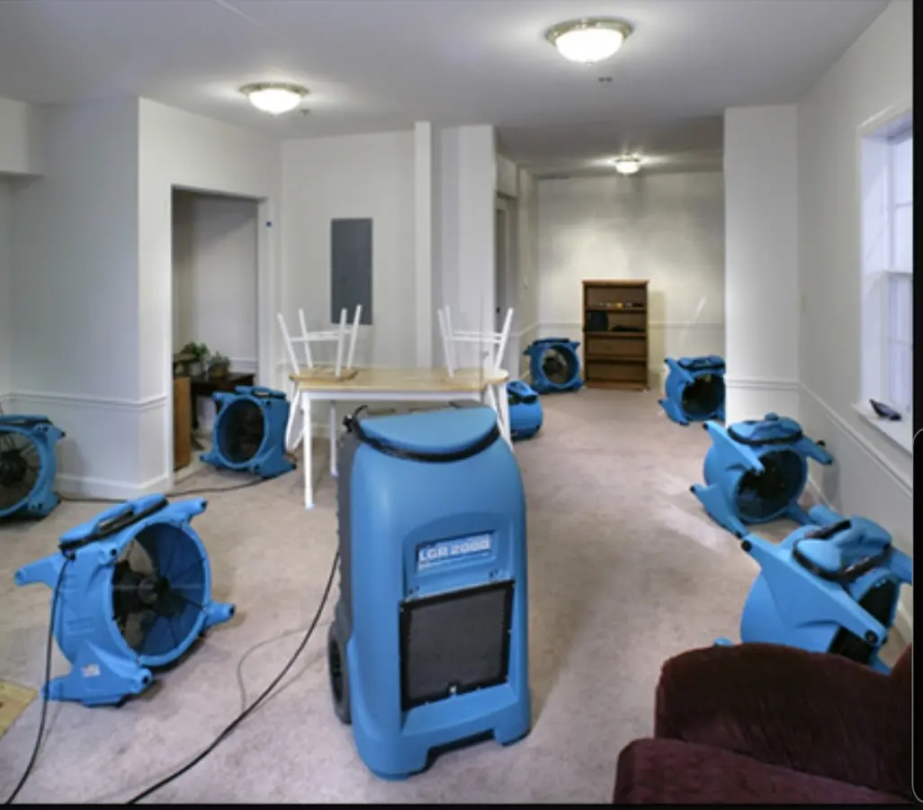 Air movers and dehumidifier setup for Water Damage Restoration in Mayfield Heights